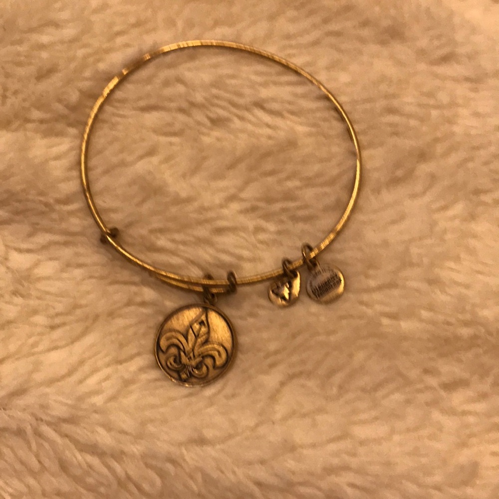 Gold Alex and Ani fleur de lis bracelet